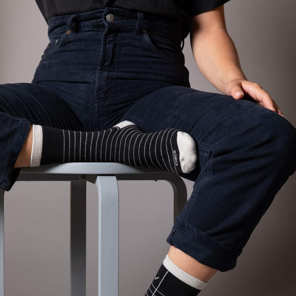 Elevate your everyday style with our elegant unisex socks designed by the KaRiniTi Studio. These monochromatic socks blend clean lines with subtle, refined details, echoing our passion for precision and typography. Perfect for any outfit, each pair brings a unique design element inspired by our studio's signature obsession with structured layouts and minimalist aesthetics.
Check: Inspired by our iconic To-Do list, this design reminds you to keep things moving. Sometimes, all it takes is a little checkmark