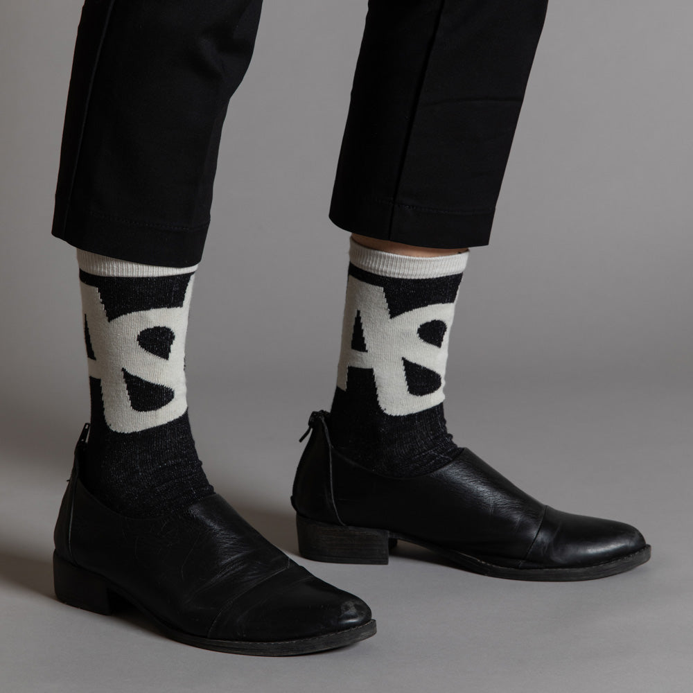 Elevate your everyday style with our elegant unisex socks designed by the KaRiniTi Studio. These monochromatic socks blend clean lines with subtle, refined details, echoing our passion for precision and typography. Perfect for any outfit, each pair brings a unique design element inspired by our studio's signature obsession with structured layouts and minimalist aesthetics.
ASAP: Make a statement with the ASAP socks, reflecting the dynamic energy of KaRiniTi's ASAP notebook. These socks are your fast track