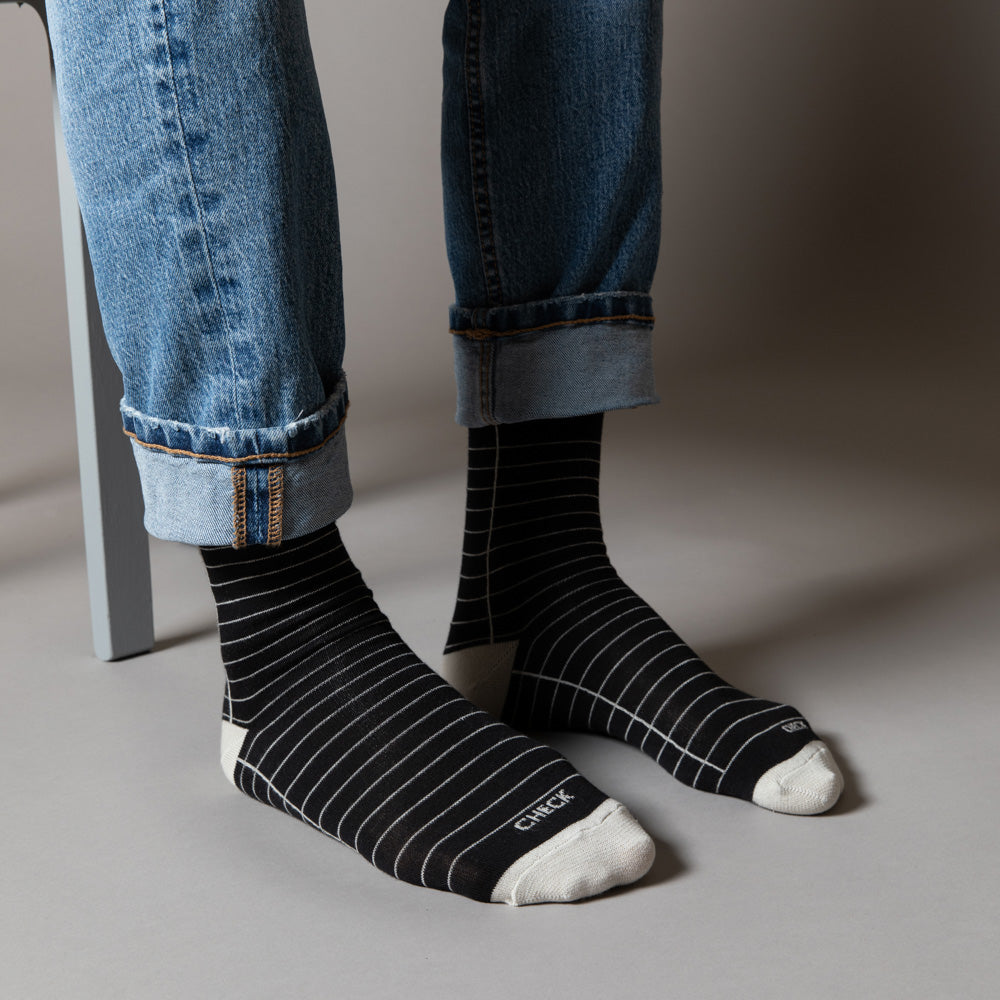 Elevate your everyday style with our elegant unisex socks designed by the KaRiniTi Studio. These monochromatic socks blend clean lines with subtle, refined details, echoing our passion for precision and typography. Perfect for any outfit, each pair brings a unique design element inspired by our studio's signature obsession with structured layouts and minimalist aesthetics.
Check: Inspired by our iconic To-Do list, this design reminds you to keep things moving. Sometimes, all it takes is a little checkmark