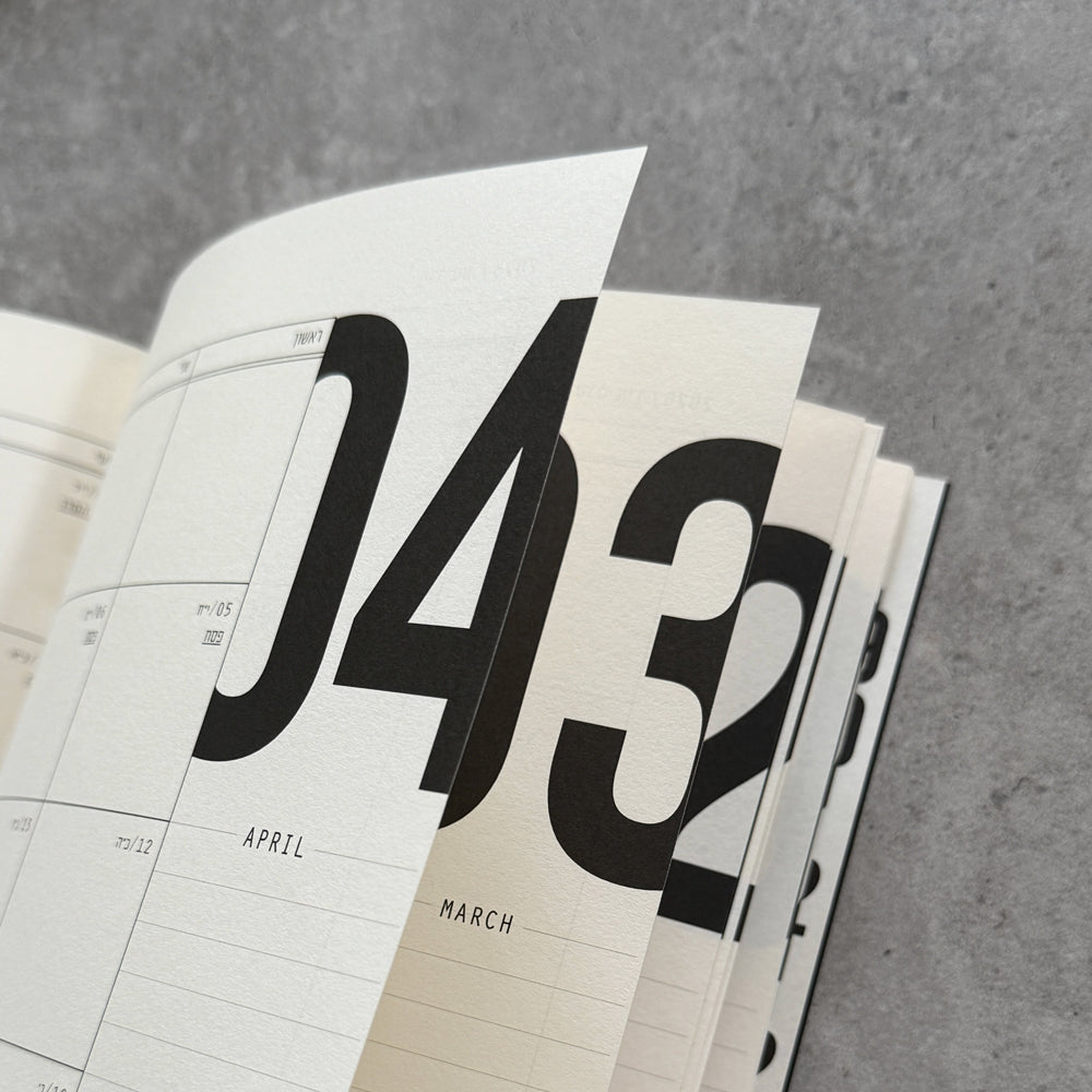 Kariniti’s 12-Month Planner for 2025/2026 (Jewish year תשפ"ו) is a compact and practical calendar-style planner designed for those who want to see the year laid out in front of them – month by month.
What’s inside?
Full yearly spread for September 2025 - August 2026 (תשפ"ו) – including Hebrew holidays and moon phases (similar to our wall calendar poster).
12 monthly spreads – with both Gregorian and Hebrew dates, holidays, and moon signs.
12 lined pages for lists, notes, and reflections.
Design details