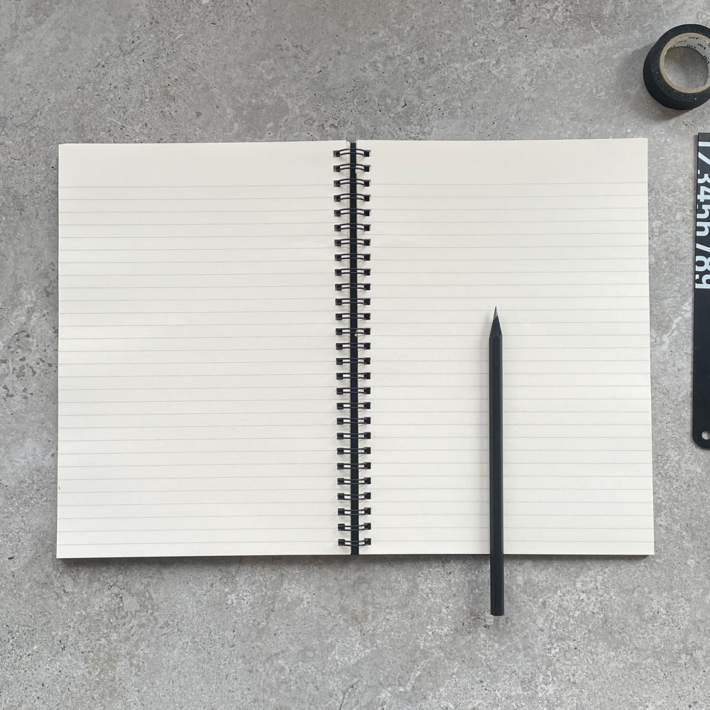 KaRiniTi - Spiral Notebook - Quotation mark A two-way spiral notebook, so you can write from right to left or left to right. Hardcover in Gray/Black â–² Size 16.5 cm -23.5 cm â–² 80 pages - lined paper