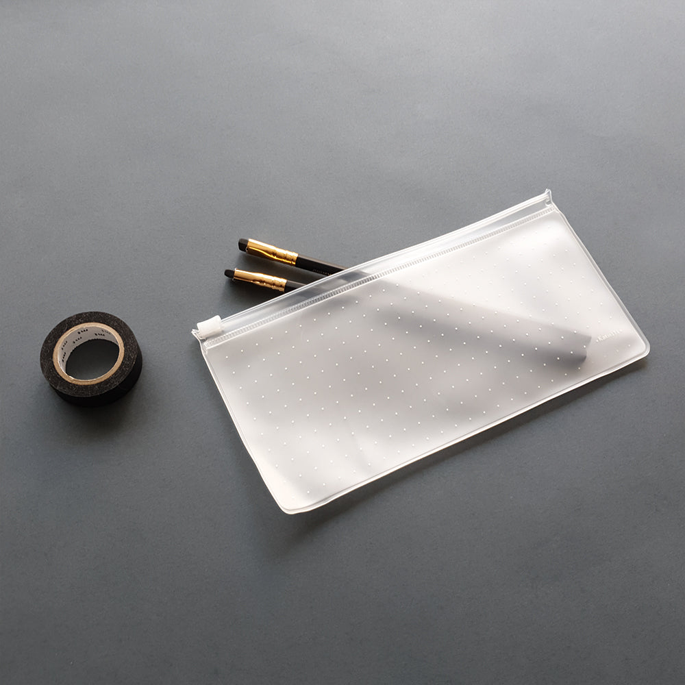 Transparent printed Zip Case - the magic pouch.  Perfect for storing and organizing all those items that always seem to find their way to the bottom of your bag!  Pens and pencils, makeup, jewelry, credit cards anything else you might need a stylish case for.  Made from Transparent EVA material (eco-friendly) with a plastic zipper.   Size small: 11 cm - 22cm / 4.5'' - 8.5''   *Items photographed with the Zip Case are not included.