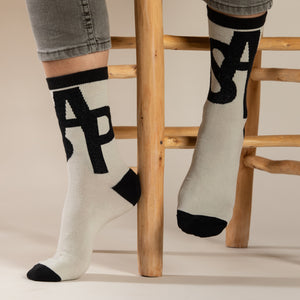 Elevate your everyday style with our elegant unisex socks designed by the KaRiniTi Studio. These monochromatic socks blend clean lines with subtle, refined details, echoing our passion for precision and typography. Perfect for any outfit, each pair brings a unique design element inspired by our studio's signature obsession with structured layouts and minimalist aesthetics.

ASAP: Make a statement with the ASAP socks, reflecting the dynamic energy of KaRiniTi's ASAP notebook. These socks are your fast track 