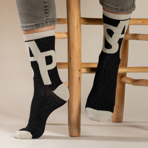 Elevate your everyday style with our elegant unisex socks designed by the KaRiniTi Studio. These monochromatic socks blend clean lines with subtle, refined details, echoing our passion for precision and typography. Perfect for any outfit, each pair brings a unique design element inspired by our studio's signature obsession with structured layouts and minimalist aesthetics.

ASAP: Make a statement with the ASAP socks, reflecting the dynamic energy of KaRiniTi's ASAP notebook. These socks are your fast track 