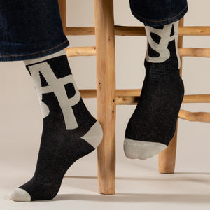 Elevate your everyday style with our elegant unisex socks designed by the KaRiniTi Studio. These monochromatic socks blend clean lines with subtle, refined details, echoing our passion for precision and typography. Perfect for any outfit, each pair brings a unique design element inspired by our studio's signature obsession with structured layouts and minimalist aesthetics.

ASAP: Make a statement with the ASAP socks, reflecting the dynamic energy of KaRiniTi's ASAP notebook. These socks are your fast track 