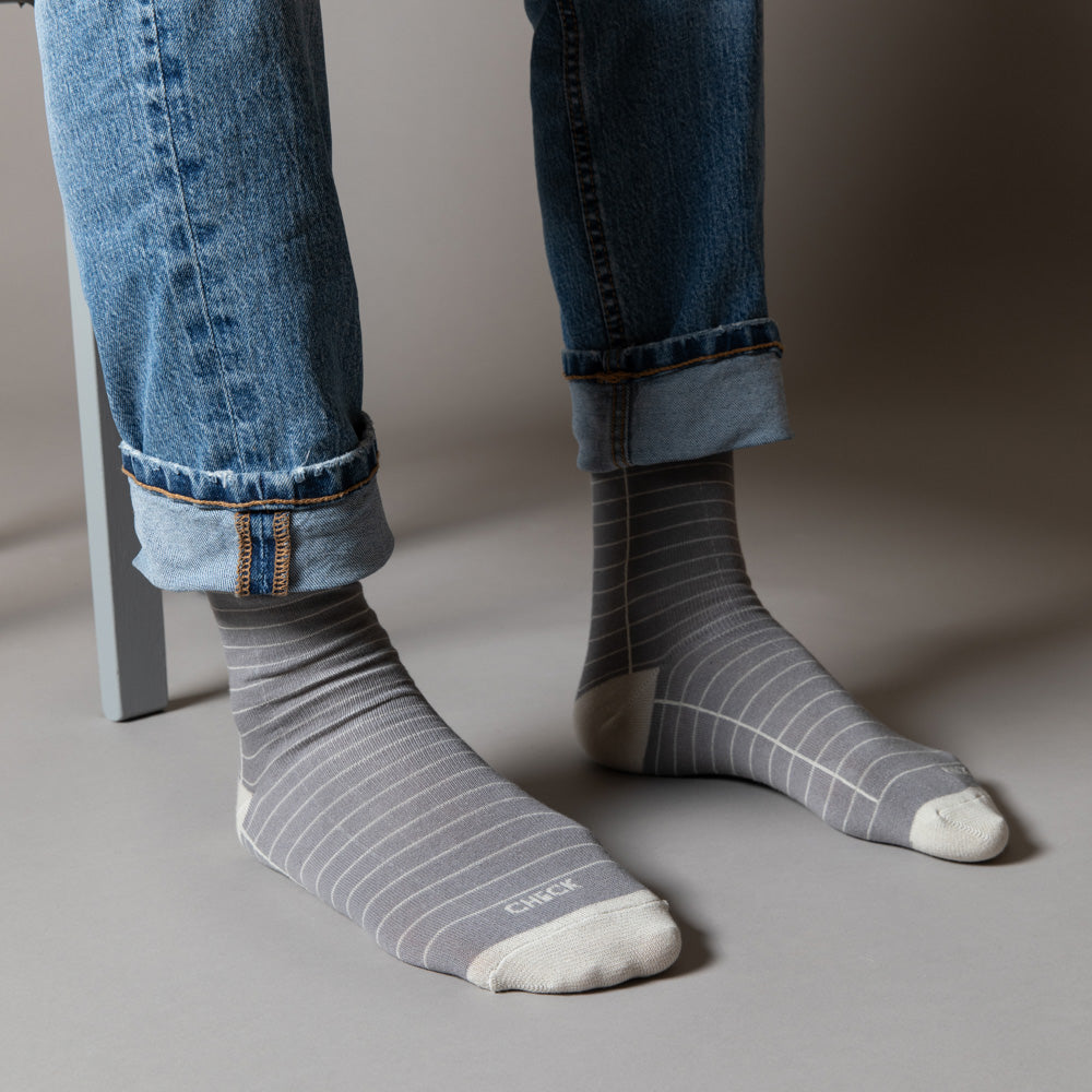 Elevate your everyday style with our elegant unisex socks designed by the KaRiniTi Studio. These monochromatic socks blend clean lines with subtle, refined details, echoing our passion for precision and typography. Perfect for any outfit, each pair brings a unique design element inspired by our studio's signature obsession with structured layouts and minimalist aesthetics.

Check: Inspired by our iconic To-Do list, this design reminds you to keep things moving. Sometimes, all it takes is a little checkmark 