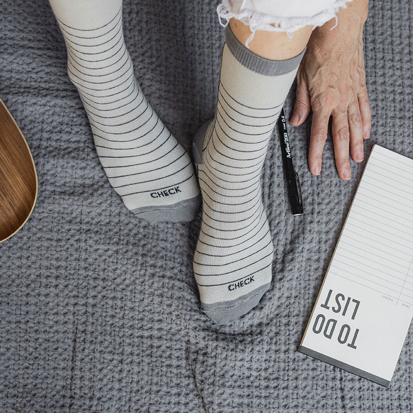 Elevate your everyday style with our elegant unisex socks designed by the KaRiniTi Studio. These monochromatic socks blend clean lines with subtle, refined details, echoing our passion for precision and typography. Perfect for any outfit, each pair brings a unique design element inspired by our studio's signature obsession with structured layouts and minimalist aesthetics.

Check: Inspired by our iconic To-Do list, this design reminds you to keep things moving. Sometimes, all it takes is a little checkmark 