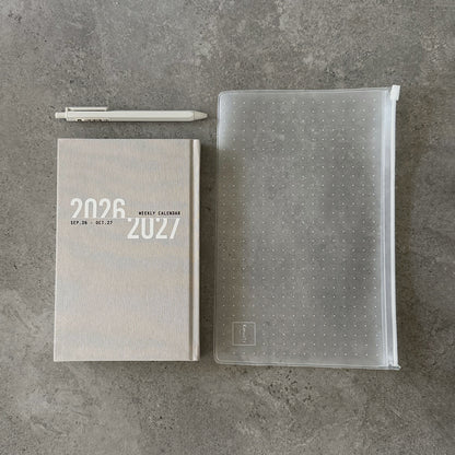 Super Light Weekly Planner set 2026/2027 – grey calendar, transparent zip case and white hexagon gel pen