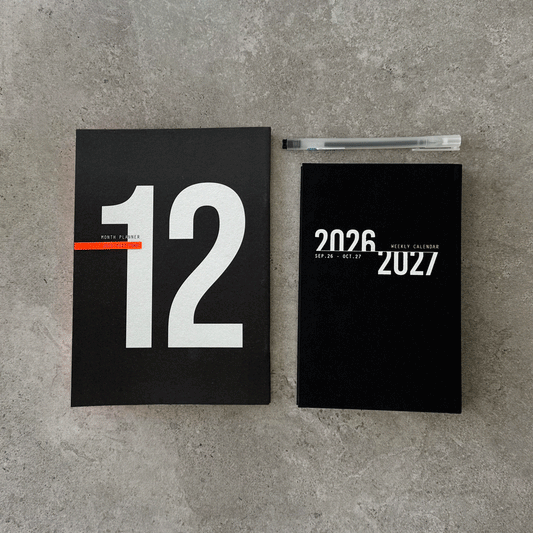 KaRiniTi Year Plan 2026/2027 – black 12-month planner and black weekly calendar with white hexagon gel pen