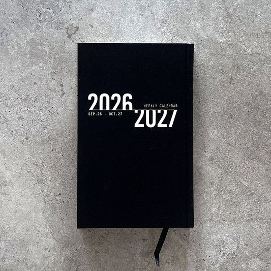 KaRiniTi Weekly Calendar 2026/2027 – black hardcover, Sep 26 – Oct 27