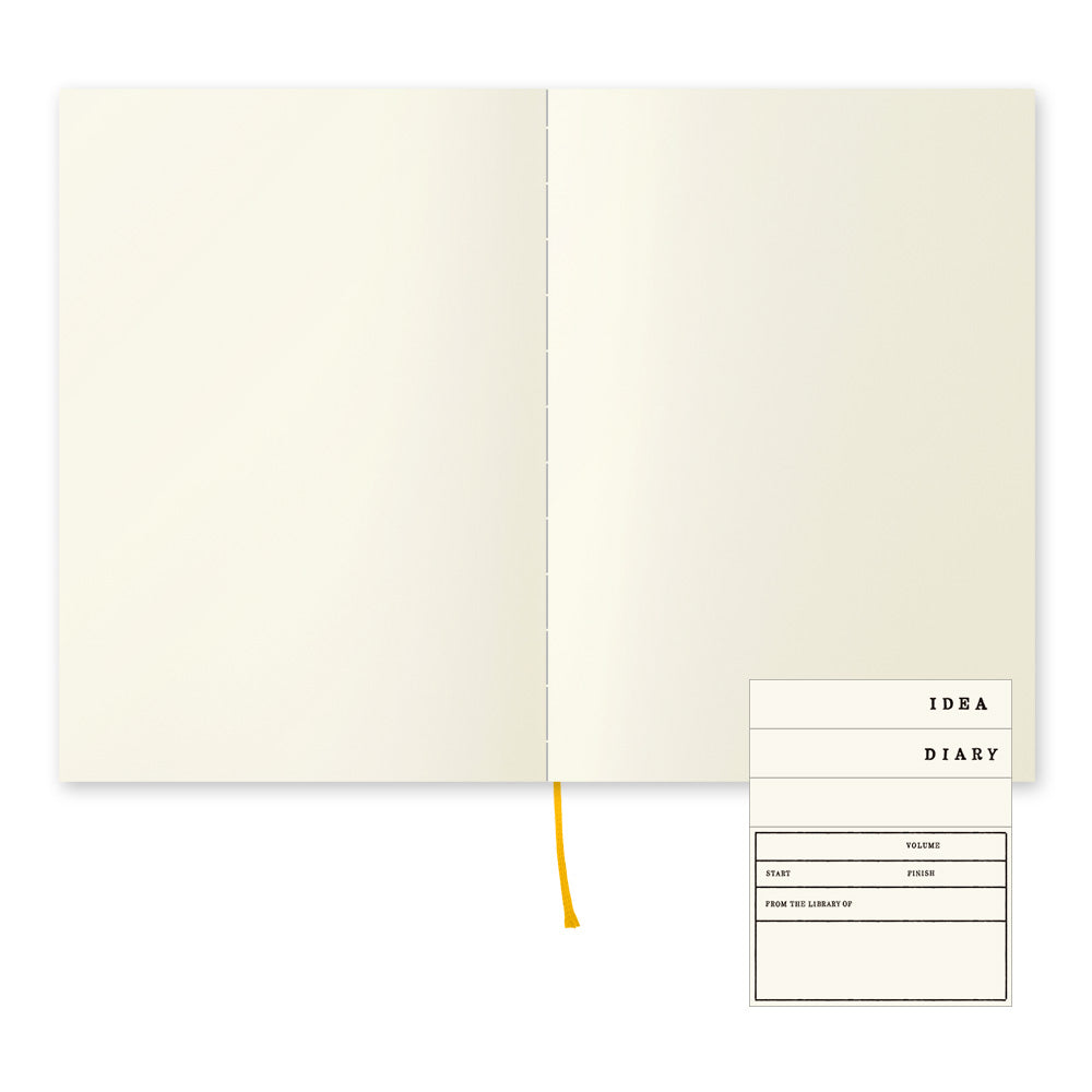 MIDORI MD Notebook A5 - Blank - open spread with ribbon and label stickers