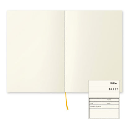 MIDORI MD Notebook A5 - Blank - open spread with ribbon and label stickers