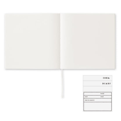 MIDORI MD Notebook Cotton - Blank - open spread with label sticker