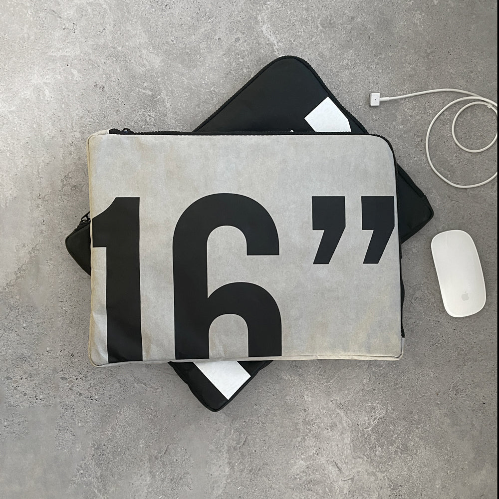 KaRiniTi - A beautiful laptop handbag â–² Suitable for computers with a maximum screen size of 16 inches â–² Made of paper with a large zipper â–² Large pocket for cables and mouse on the back â–² Available in black and gray