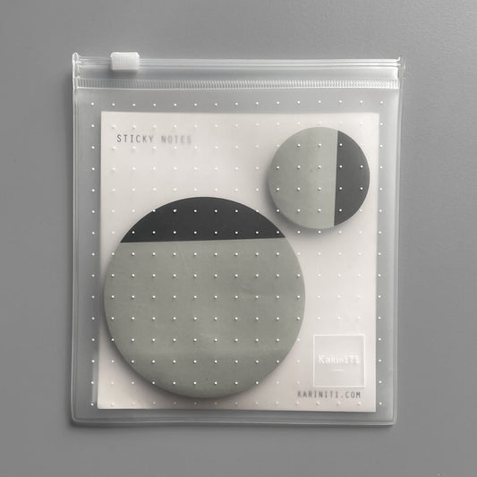 A set of Two round Sticky Notes  ▲ 8 cm diameter pad + 4 cm diameter pad  ▲ 20 pages  ▲ Gray paper, Black print  ▲ cardboard back  ▲ Packaged in an ECO-friendly zipper pouch