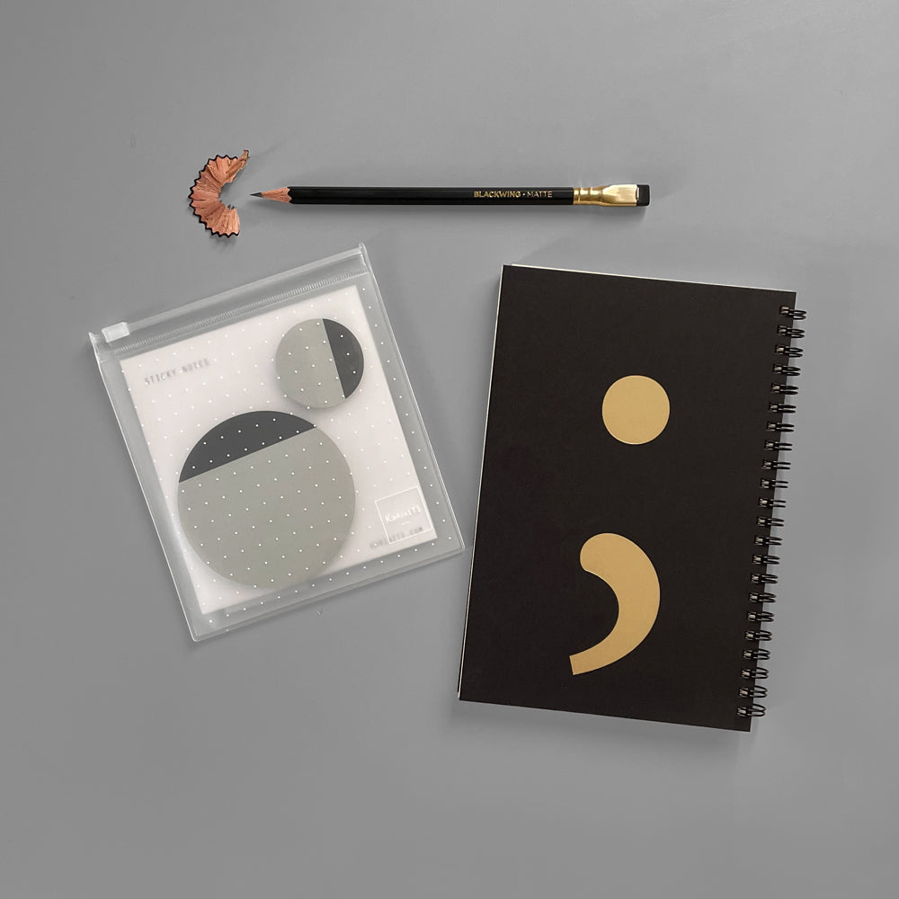 The Sticky Spiral Combo  In this combo you'll find:  ▲ Sticky Notes  ▲ Spiral Notebook - Semicolon Cover (Black cover / Gray color)  ▲ Palomino Blackwing Pencil